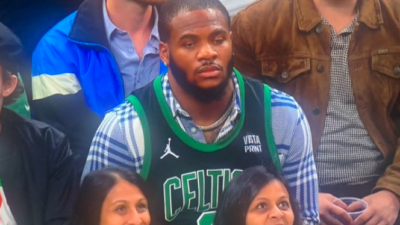 Micah Parsons Wearing a Celtics Jersey